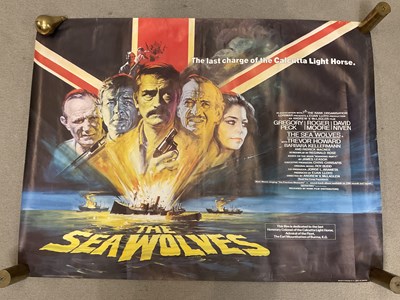 Lot 2377 - THE SEA WOLVES; a 1980s quad poster, 76 x 101cm.