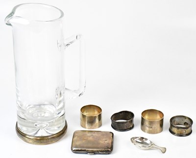 Lot 558 - A small collection of silver items to include...