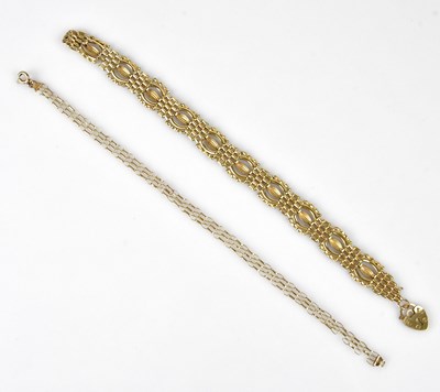 Lot 81 - A 9ct gate link bracelet with padlock clasp,...