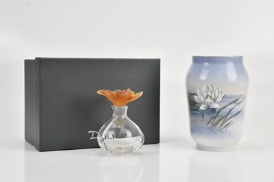 Lot 1557 - ROYAL COPENHAGEN; a vase decorated with lily...