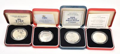 Lot 571 - A collection of four silver proof coins...