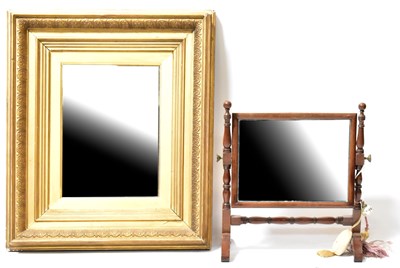 Lot 101 - A gilt framed wall mirror, with rectangular...