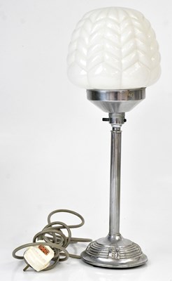 Lot 121 - An Art Deco chrome table lamp with an opaque...