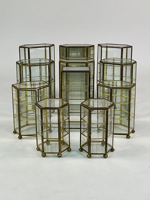 Lot 25 - A quantity of brass and glass miniature...