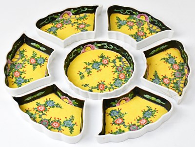 Lot 253 - A Famille Jaune set of hors d'oeuvre dishes,...