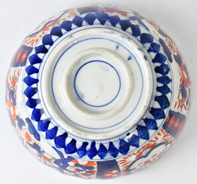 Lot 230 - A Japanese Meiji period Imari bowl of fluted...