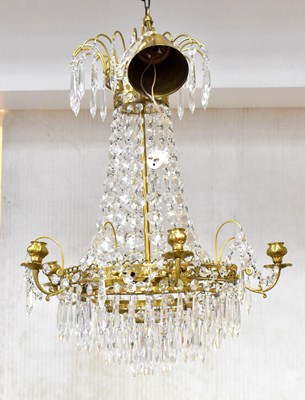 Lot 114 - A Swedish Empire style cast metal and crystal...