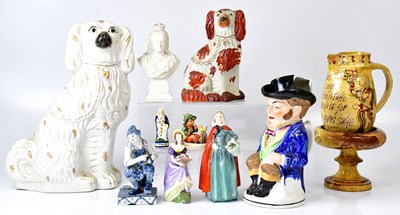 Lot 197 - A collection of Staffordshire flatback and...
