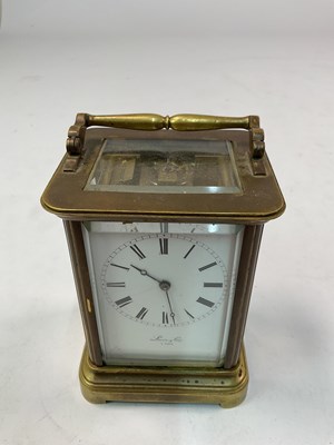 Lot 343 - LEVIN & CIE; a mounted carriage clock with...