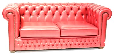 Lot 45 - A modern Chesterfield red leather three-seater...