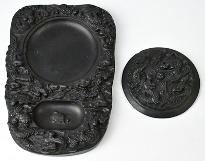 Lot 241 - A Chinese black ink stone, the mo-tang relief...