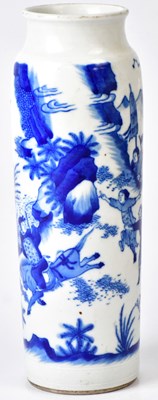 Lot 245 - A blue and white cylindrical vase painted with...