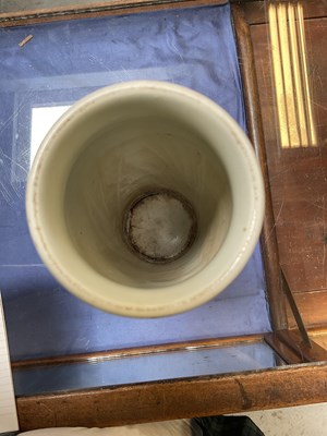 Lot 245 - A blue and white cylindrical vase painted with...