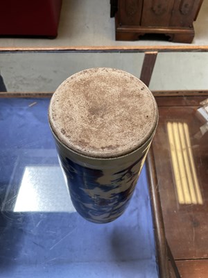 Lot 245 - A blue and white cylindrical vase painted with...