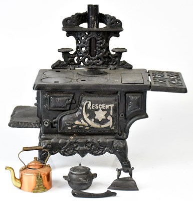 Lot 526 - A novelty cast iron range cooker, stamped...