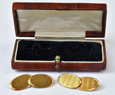 Lot 958 - A pair of 15ct yellow gold oval cufflinks with...