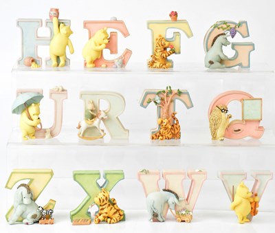 Lot 370 - A set of Winnie the Pooh alphabet letters,...