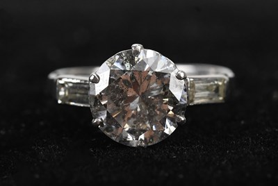 Lot 357 - An Art Deco style diamond solitaire dress ring,...