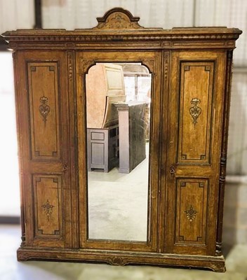 Lot 658 - A late 19th century mahogany linen press with...