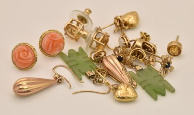 Lot 1386 - Nine pairs of 9ct yellow gold earrings...