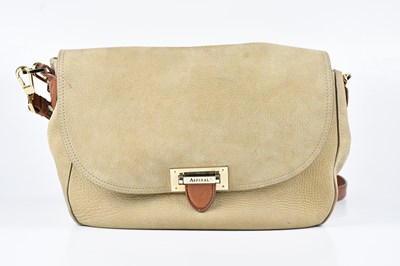 Lot 1357 - ASPINAL; a grained beige nubuck leather...