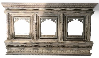Lot 8 - An Indian jharokha profusely carved wooden...
