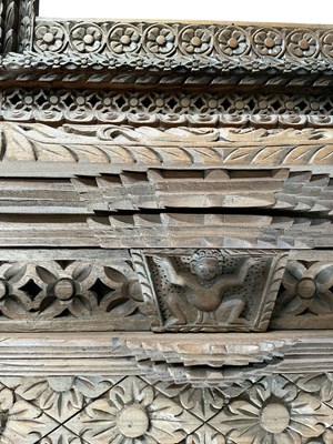 Lot 8 - An Indian jharokha profusely carved wooden...