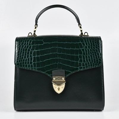 Lot 1361 - ASPINAL; a green leather and embossed...