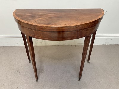 Lot 1296 - A 19th century inlaid mahogany demi-lune...