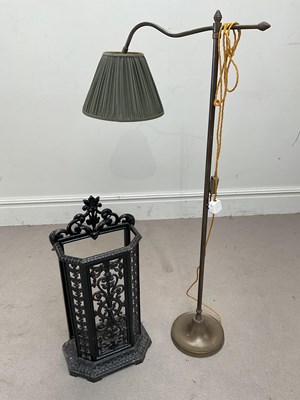 Lot 2132 - A black painted cast iron umbrella/stick stand,...