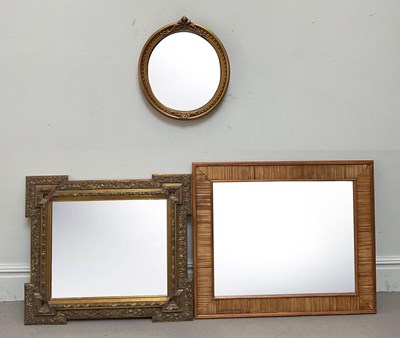 Lot 1008 - A vintage straw framed wall mirror, 79 x 95cm,...