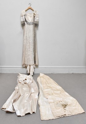 Lot 1312 - An Edwardian style cream silk satin full...