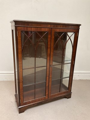 Lot 1112 - A reproduction mahogany display cabinet with...