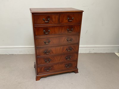 Lot 1110 - A reproduction mahogany chest of two short...