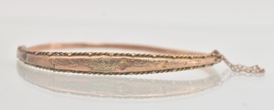 Lot 1419 - A 9ct yellow gold hinged snap bangle, diameter...