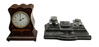 Lot 326 - An early 20th century bakelite brass inlaid...