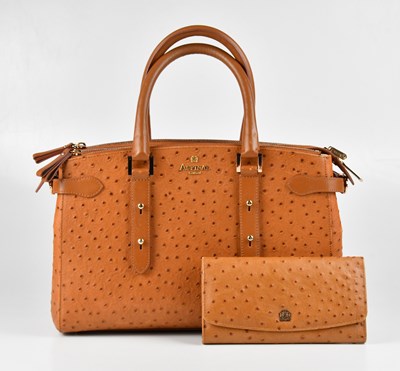 Lot 1373 - ASPINAL; a tan ostrich leather embossed...