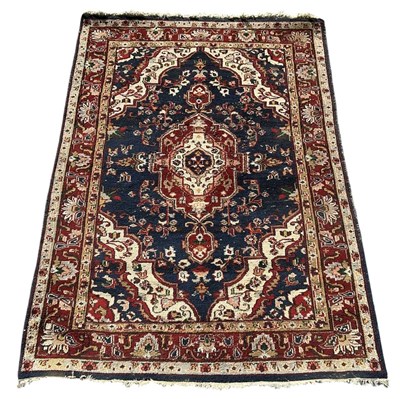 Lot 116 - A modern machine made Persian style wool pile...