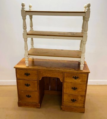 Lot 667 - A 20th century pine writing desk, with three...