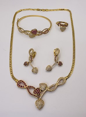 Lot 534 - DELMON; a suite of 18ct gold, ruby and diamond...
