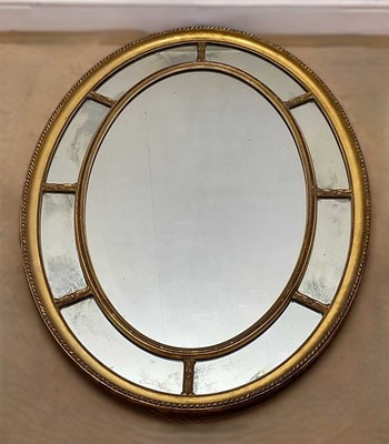 Lot 721 - A large 20th century oval and gilt framed wall...