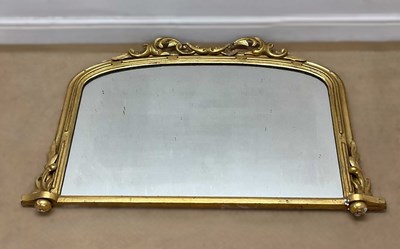 Lot 722 - A gilt framed overmantel mirror, with...