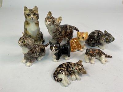 Lot 284 - WINSTANLEY; a collection of eight cats,...
