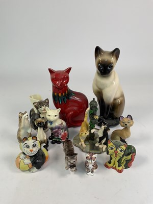 Lot 311 - LORNA BAILEY; a cat with its paws on a beach...