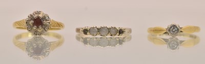 Lot 1325 - Three gold rings comprising an 18ct yellow...