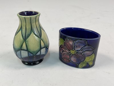 Lot 300 - MOORCROFT; a vase in the 'Indigo' pattern by...