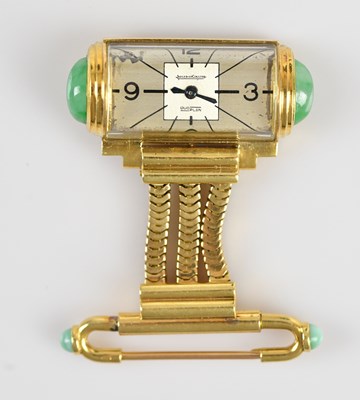 Lot 1007 - JAEGER LE COULTRE; an 18ct gold Duoplan...
