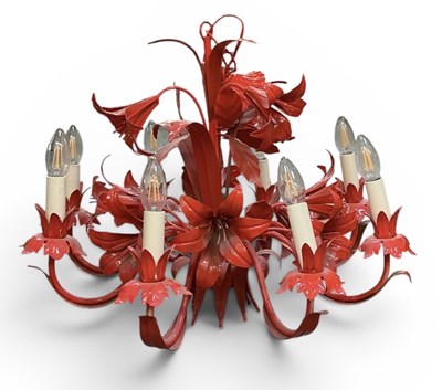 Lot 119 - A modern red painted floral eight branch...