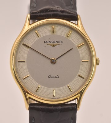 Lot 1552 - LONGINES; a vintage gentleman's gold plated...