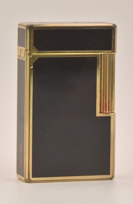 Lot 302 - S T DUPONT; a vintage mid century gold plated...